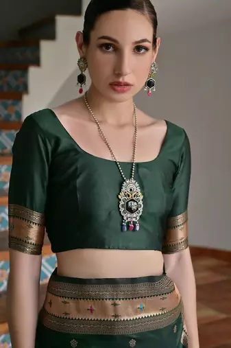 green silk blend paithani woven saree with blouse