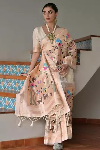 cream silk blend paithani woven saree with blouse
