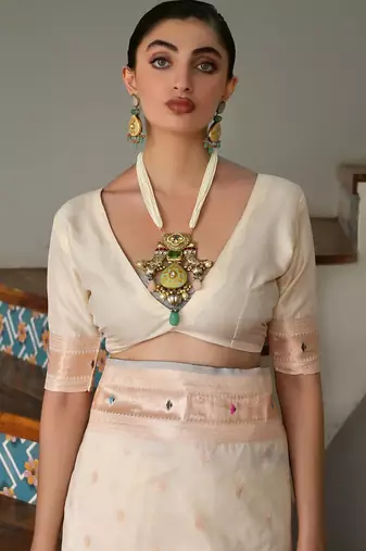 cream silk blend paithani woven saree with blouse