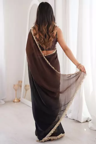 black fendi satin double shaded sequins with zari lace work saree with blouse