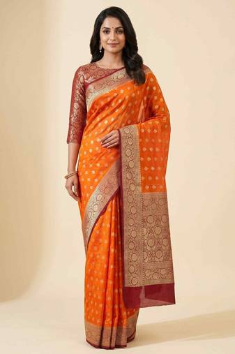 Banarasi cotton silk saree in orange with   zari booti   work