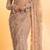 Light beige net saree with sequins embroidery work