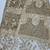 Light beige net saree with sequins embroidery work
