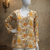 YELLOW  REYON WITH DIGITAL PRINTED STYLISH WEAR KURTI 