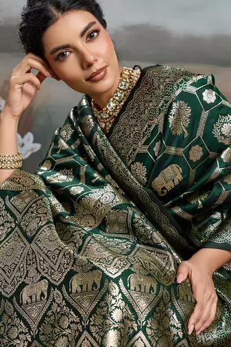 women woven kanjivaram silk blend saree with blouse piece 