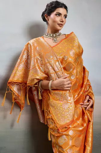 women woven kanjivaram silk blend saree with blouse piece 