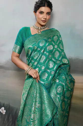 women woven kanjivaram silk blend saree with blouse piece 