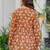 Womens orange self design cotton fabric kurtis 3/4 sleeves v-neck