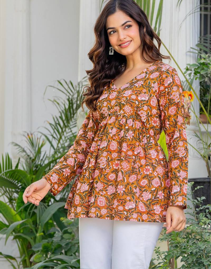Womens orange self design cotton fabric kurtis 3/4 sleeves v-neck
