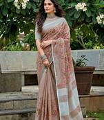 women linen saree with  embroidery and tassel pallu