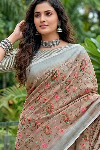 women linen saree with embroidery and tassel pallu