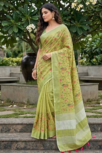 women linen saree with embroidery and tassel pallu