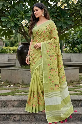 women linen saree with  embroidery and tassel pallu