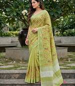 women linen saree with  embroidery and tassel pallu