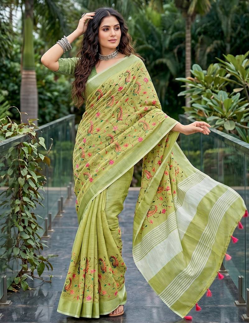women linen saree with  embroidery and tassel pallu