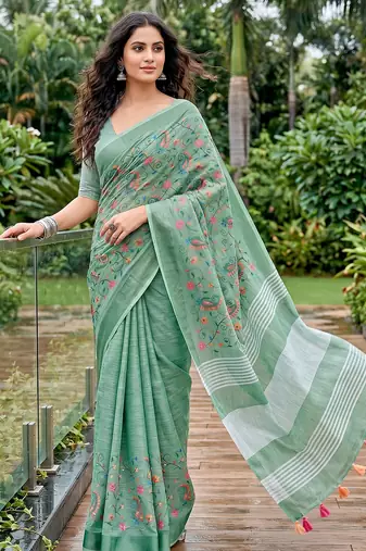women linen saree with  embroidery and tassel pallu