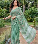 women linen saree with  embroidery and tassel pallu