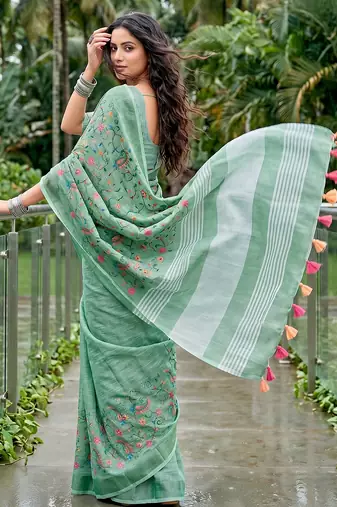 women linen saree with embroidery and tassel pallu