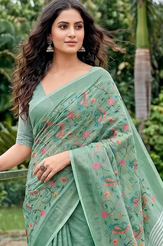 women linen saree with embroidery and tassel pallu