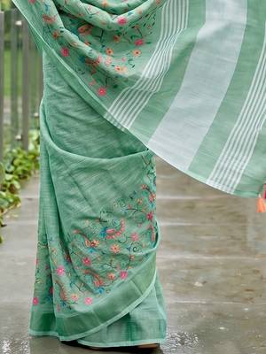 women linen saree with embroidery and tassel pallu 4