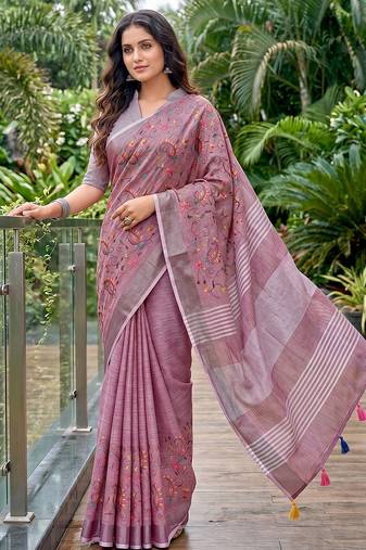 women linen saree with  embroidery and tassel pallu