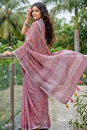 women linen saree with embroidery and tassel pallu