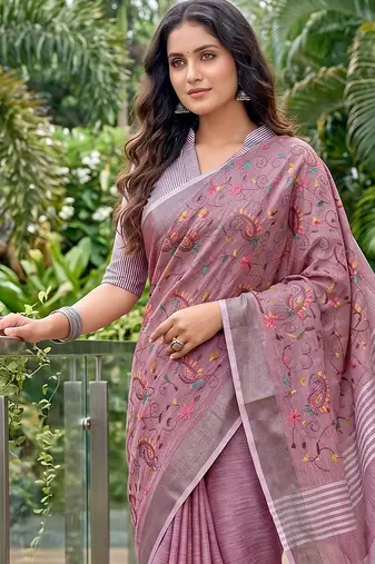 women linen saree with embroidery and tassel pallu