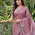 women linen saree with  embroidery and tassel pallu
