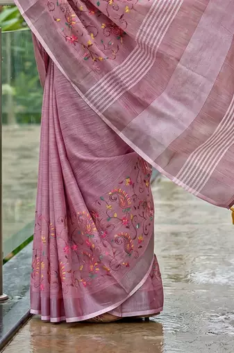 women linen saree with embroidery and tassel pallu