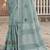 women sea green linen saree with floral embroidery border & tassels