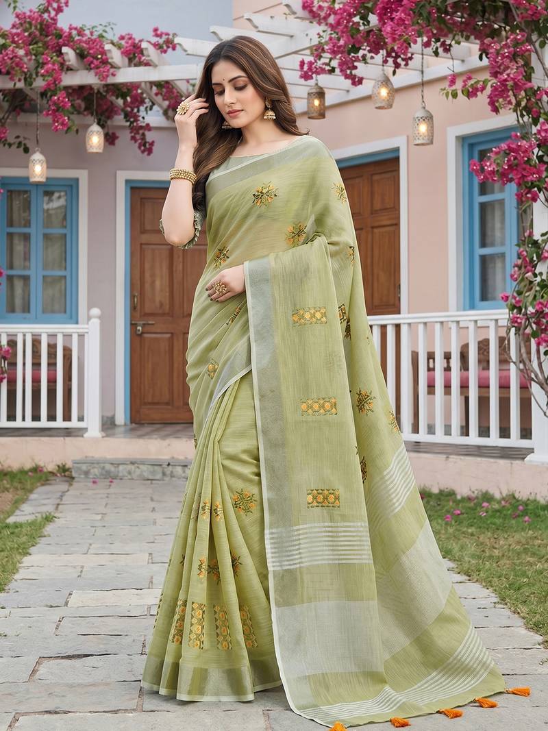 women light green linen saree with floral embroidery border & tassels