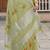 women light green linen saree with floral embroidery border & tassels