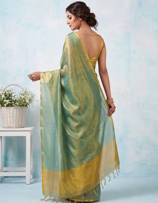 women teal green & gold-toned solid tissue silk blend saree with zari border 2