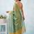 women teal green & gold-toned solid tissue silk blend saree with zari border