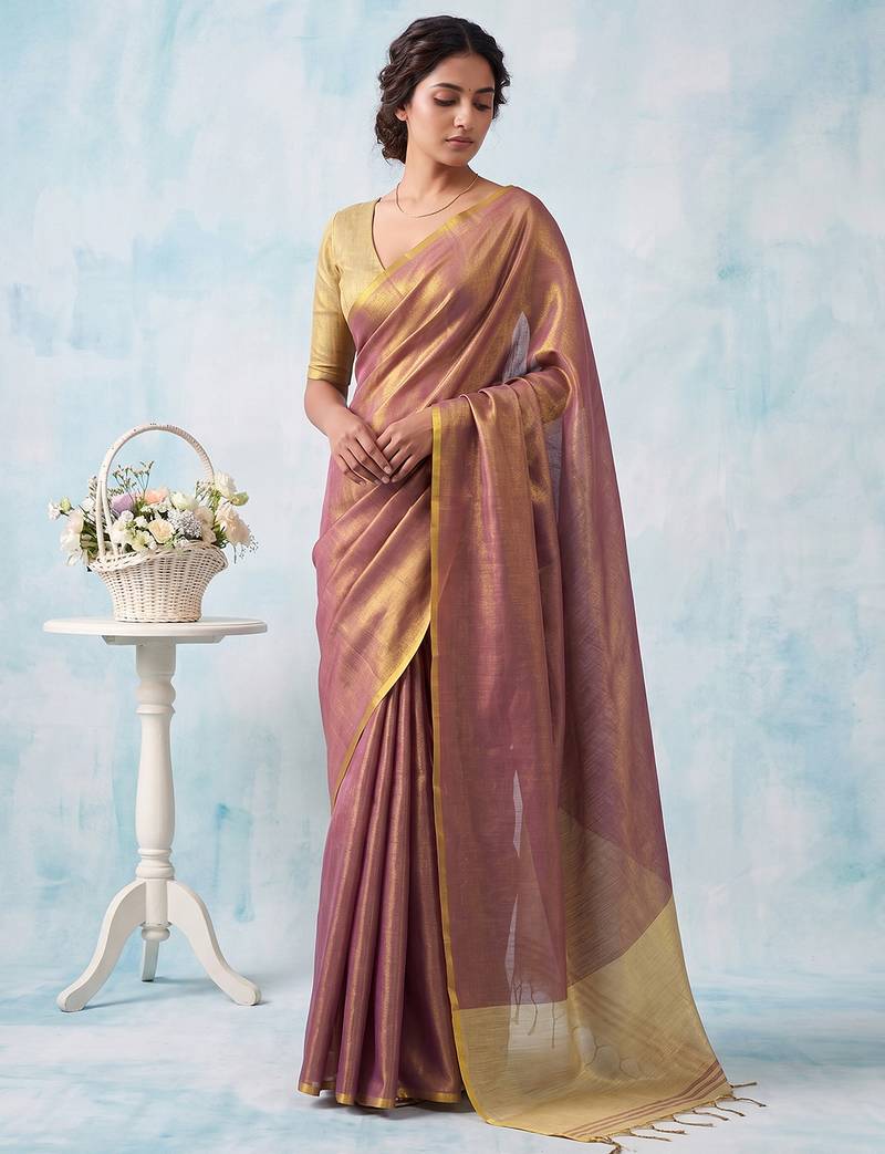 women mauve blue & gold-toned solid tissue silk blend shimmer saree