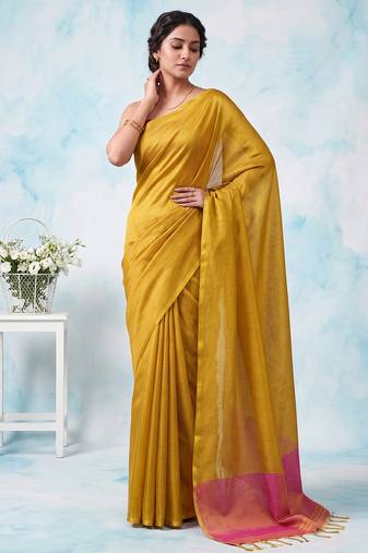 women bright yellow & pink solid tissue silk blend saree with zari border