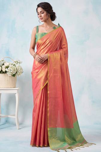 women coral peach & green solid tissue silk blend saree with contrast border