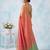 women coral peach & green solid tissue silk blend saree with contrast border