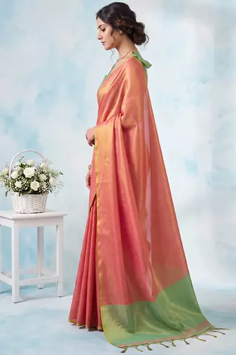 women coral peach & green solid tissue silk blend saree with contrast border