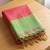 women coral peach & green solid tissue silk blend saree with contrast border