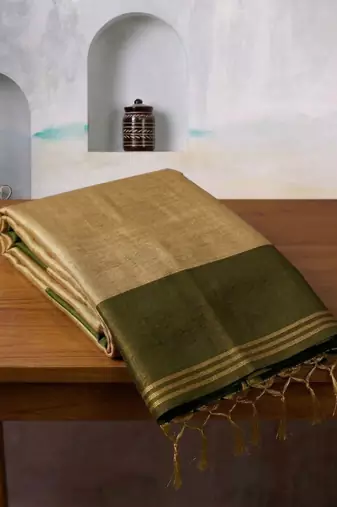 women beige & olive green solid tissue silk blend saree with zari border
