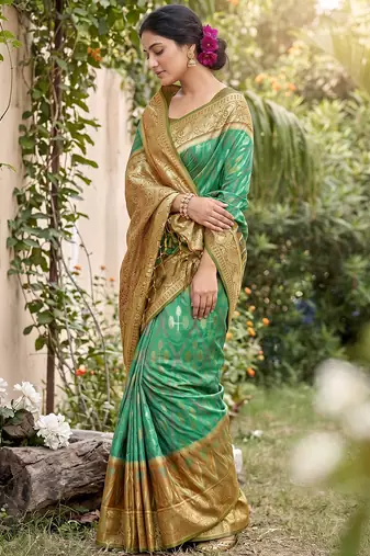 green pochampalli silk blend saree 