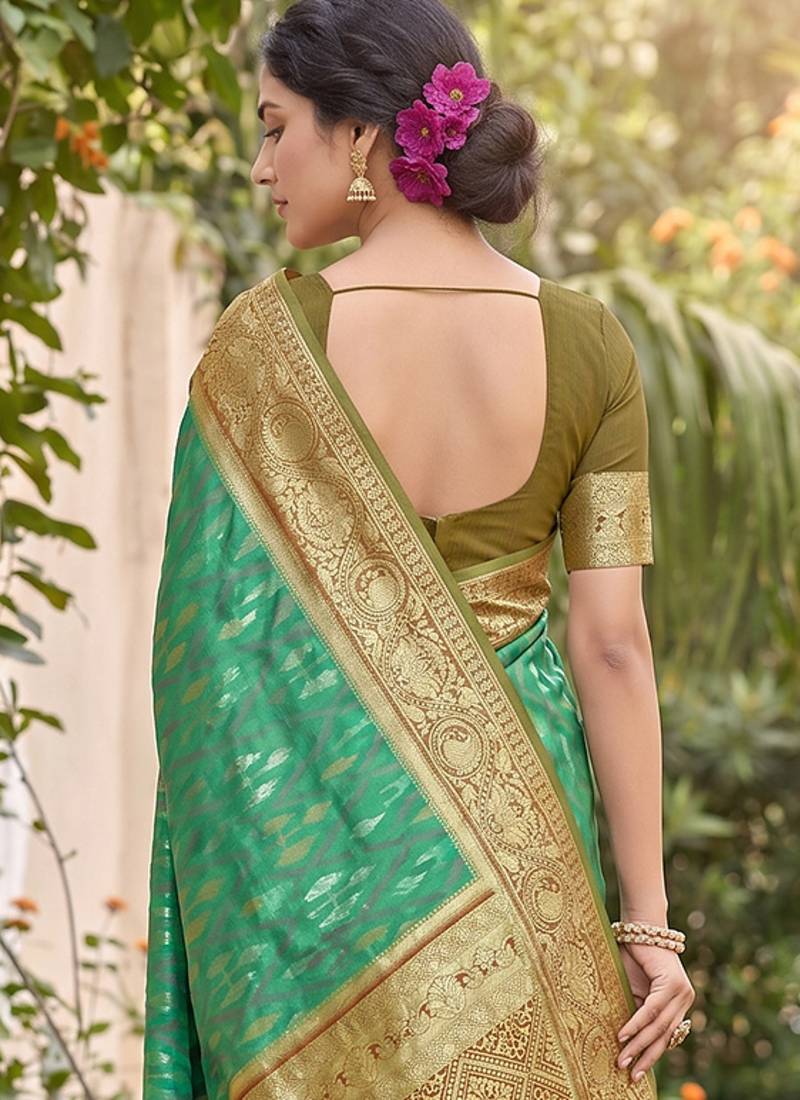 green pochampalli silk blend saree 