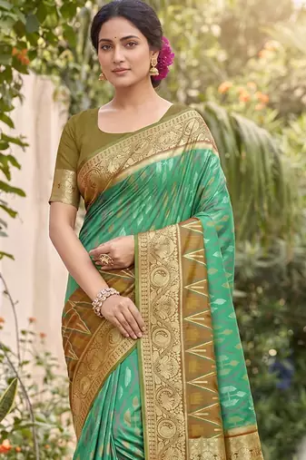 green pochampalli silk blend saree 