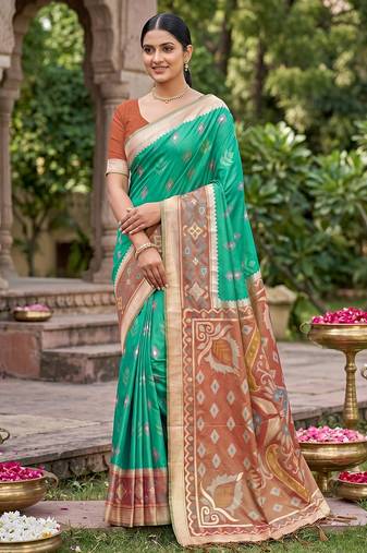 green pochampalli silk blend saree 