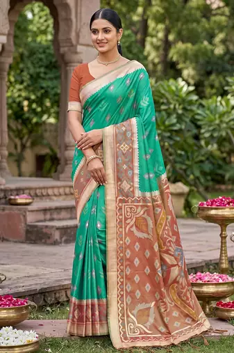 green pochampalli silk blend saree 