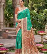 green pochampalli silk blend saree 