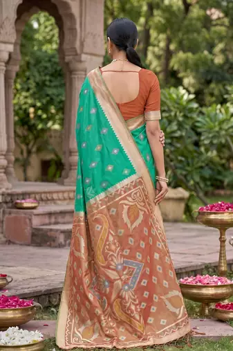 green pochampalli silk blend saree 