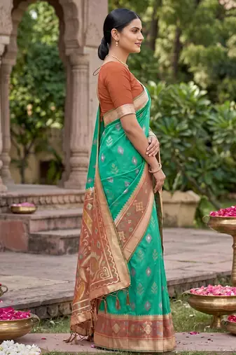 green pochampalli silk blend saree 