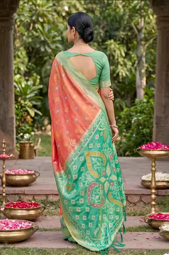 orange pochampalli silk blend saree 